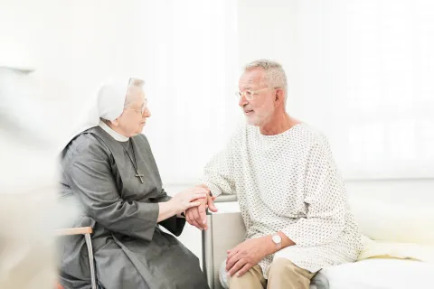 Schwester mit Patient